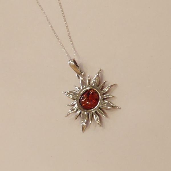 Click to view detail for HWG-154 Pendant, Sunburst Amber $42